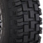 Close up detail image of the System 3 RX600 Rally Cross Tire's tread pattern. This tread features staggered horizontal grooves that give increased traction. This helps set this tire apart as a new standard in high-performance off-road tires.